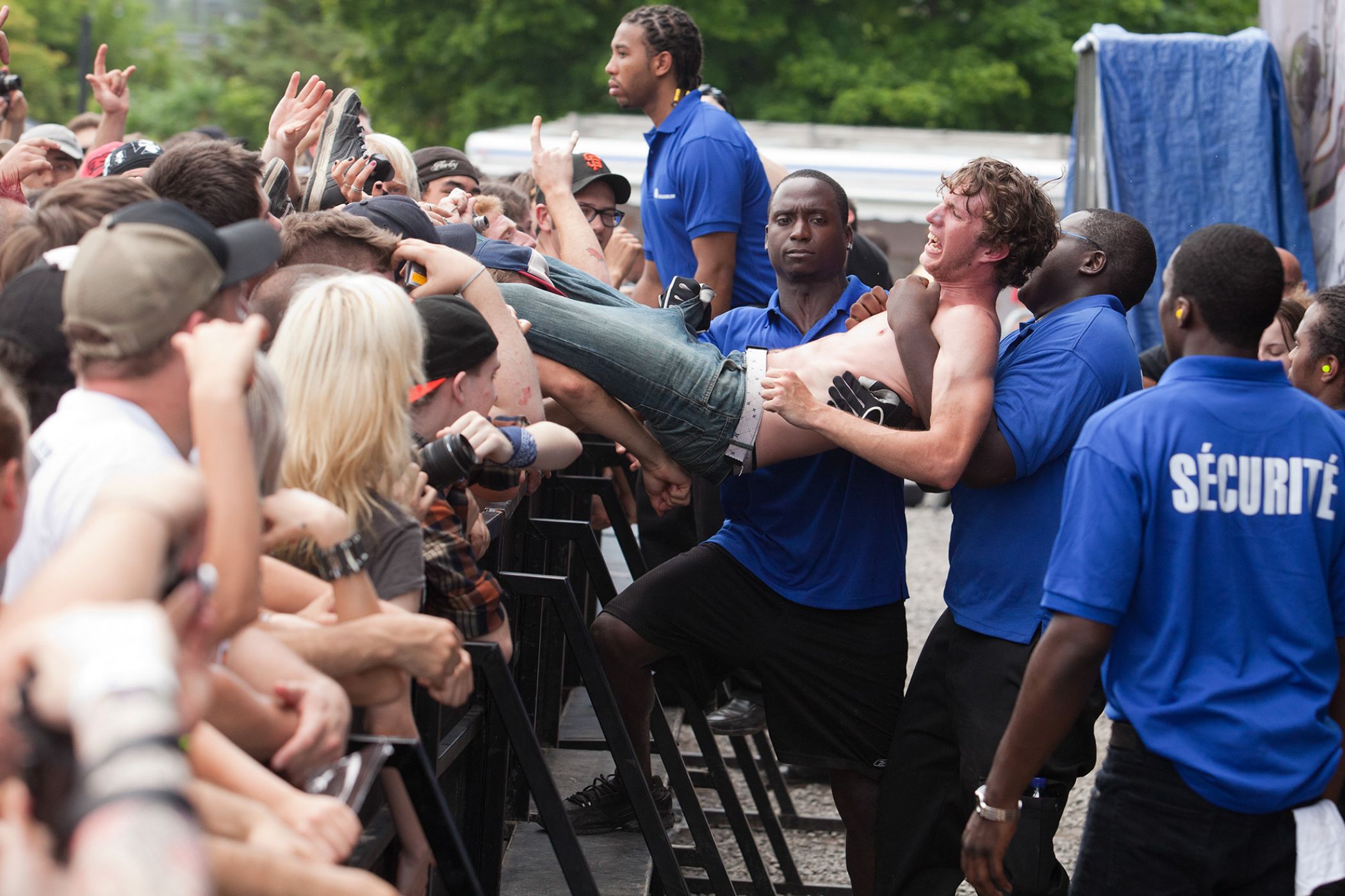 One of the participants gets out by security.