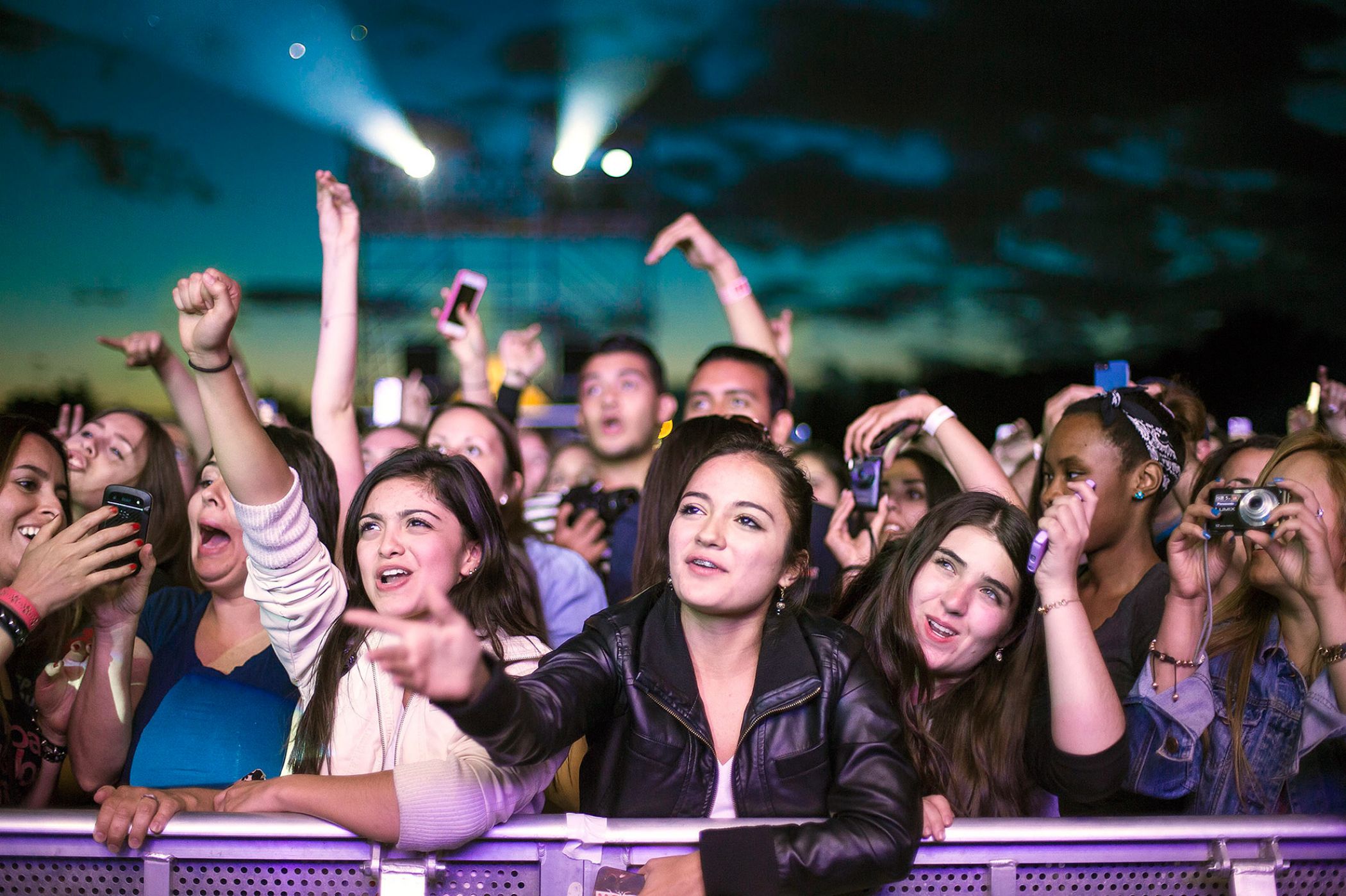 in ecstasy in front of their favorite artist